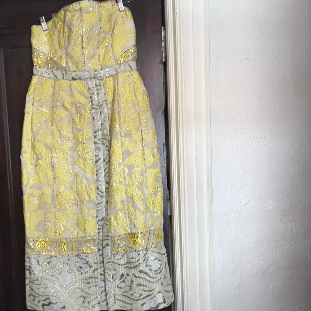 12.   New with tags strapless dress.